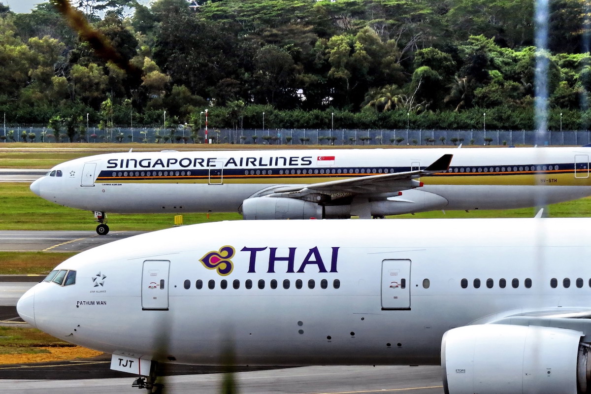Thai Airways and Singapore Airlines planes at Changi Airport